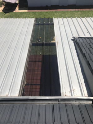 replacing a roofing sheet